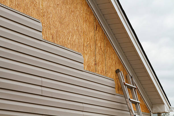 Professional Emergency Siding Repair technician working in Holbrook, NY